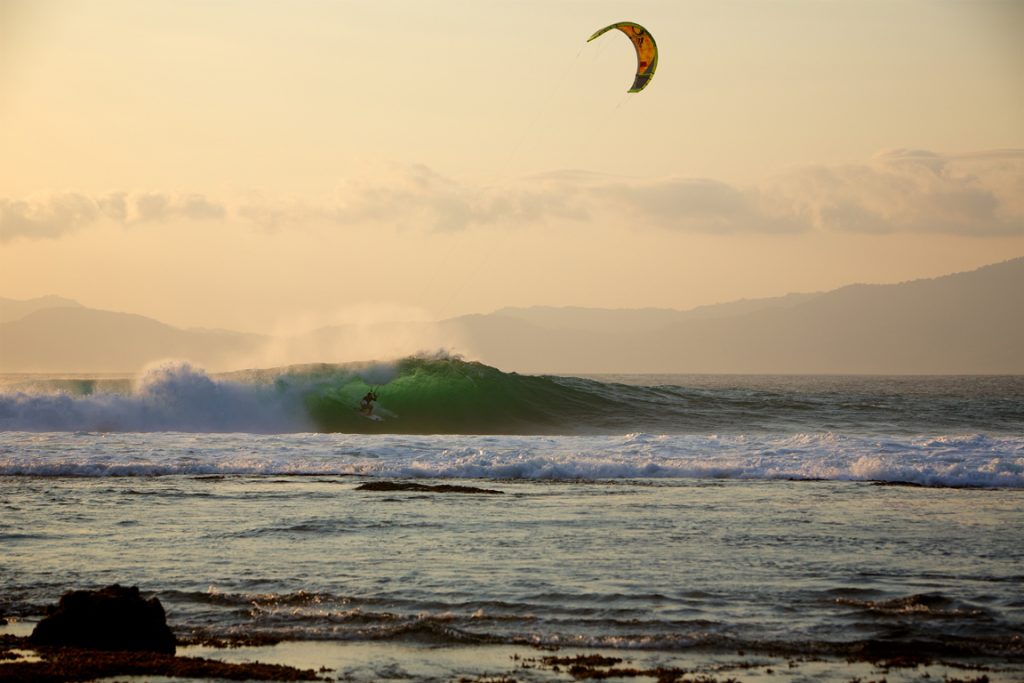 Reo Stevens kitesurfing barrel Indonesia by Jason Wolcott